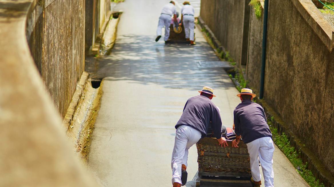 Descending from Monte to Funchal in this enormous wicker basket steered by the Monte basket carrier,  is one of Madeira’s biggest draws