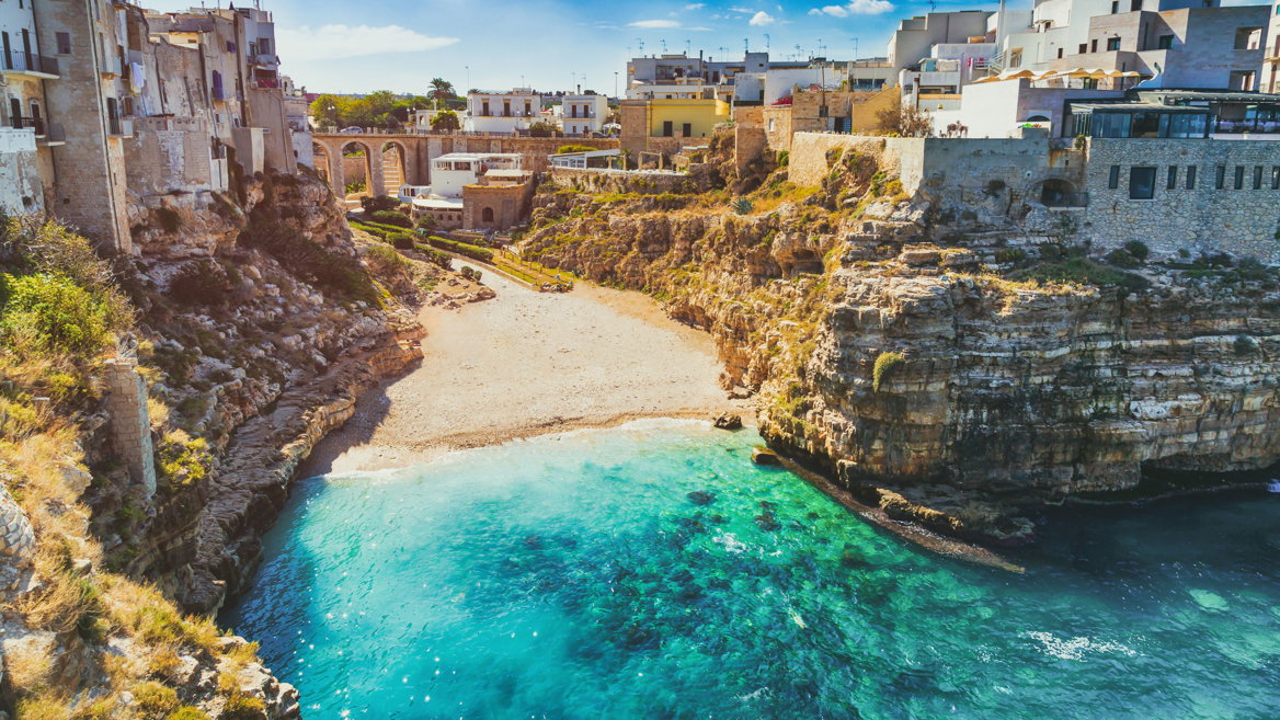 Polignano a Mare, just a half-hour from Bari, is home to some of Italy’s best beaches, including Lama Monachile.