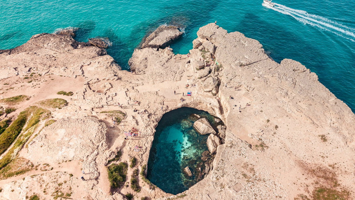 The Roca Vecchia archaeological site has spectacular spots such as the Grotta della Poesia, a natural pool with turquoise-coloured water carved into a rock.