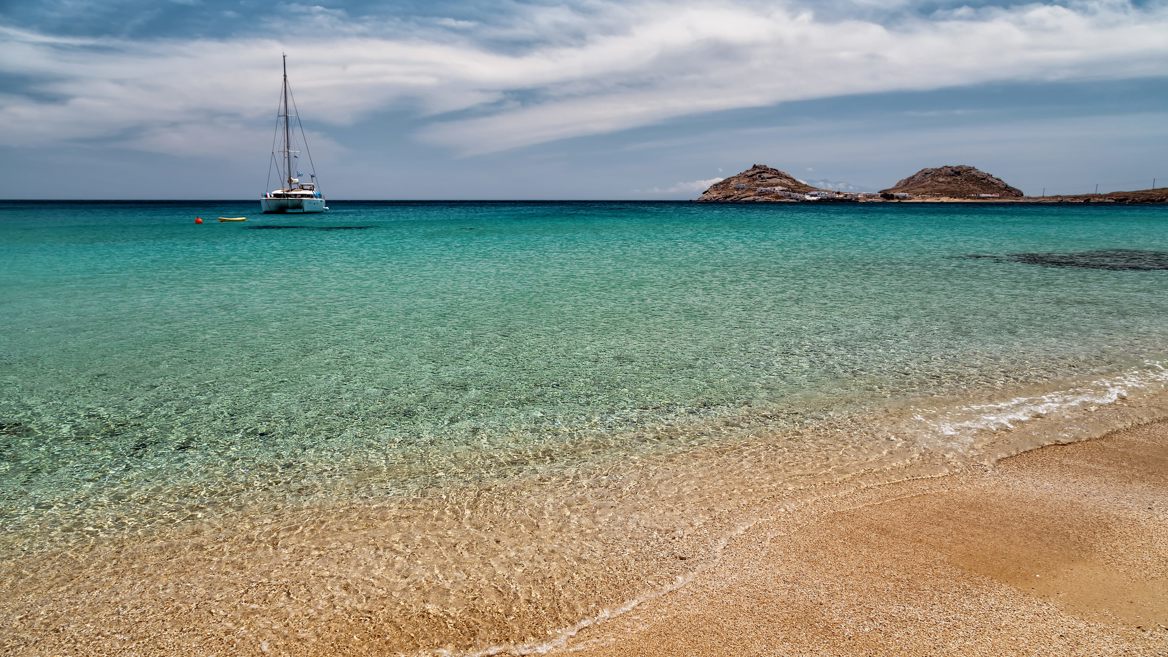 The crystal clear waters of Kalafatis are perfect for water sports