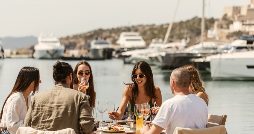 View of the diners enjoying Lado in the port of Ibiza