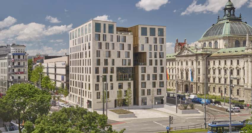 Urban view of the sugar cube structure of the Hotel Koenigshof, a Luxury Collection Hotel, Munich, Germany