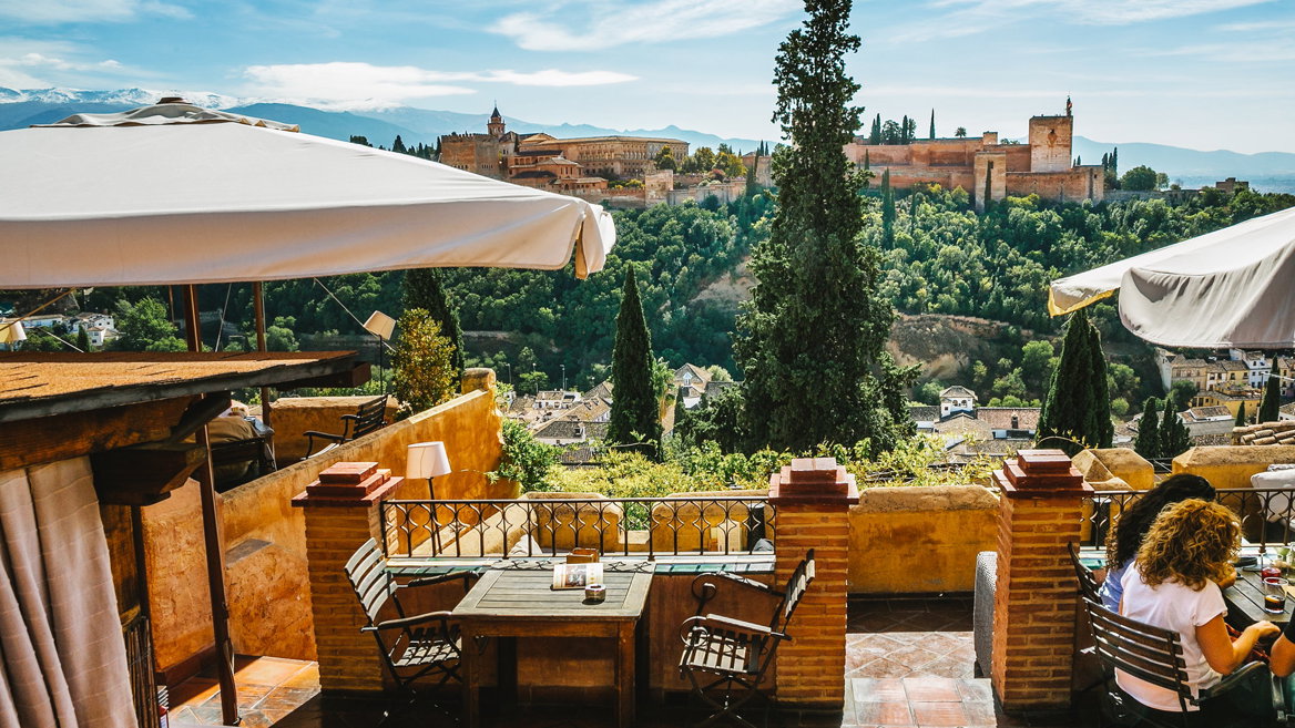 Choose one of the many Albaicín restaurants with a balcony facing the Alhambra